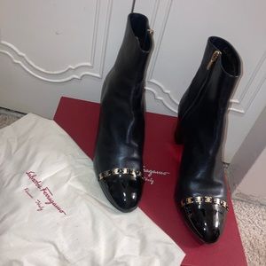 Ferragamo leather zip up boots with parent leather tors and chain linked design